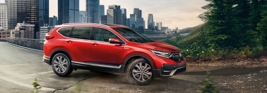 Orange 2020 Honda CR-V on City Street and Trail