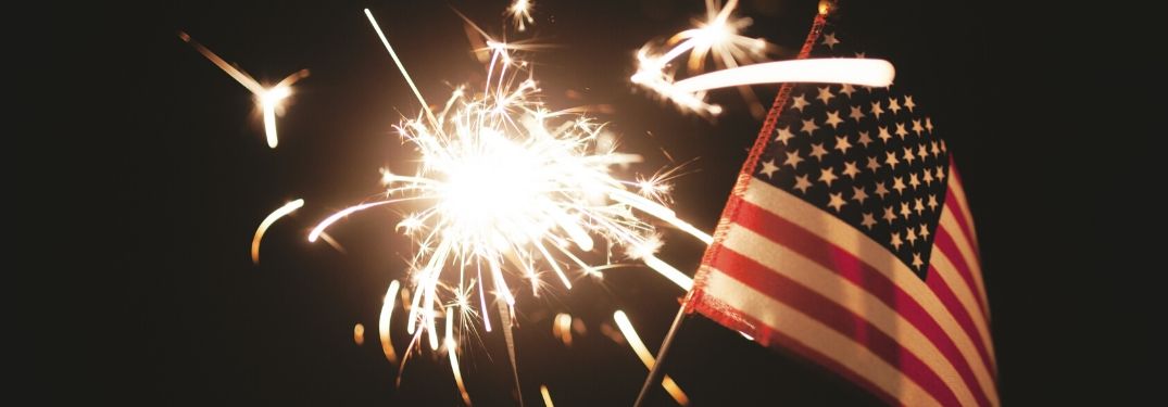Close Up of American Flag and a Sparkler