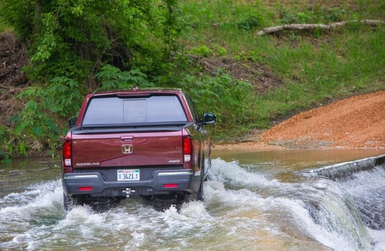 Red 2020 Honda Ridgeline Rear Exterior Fording a River