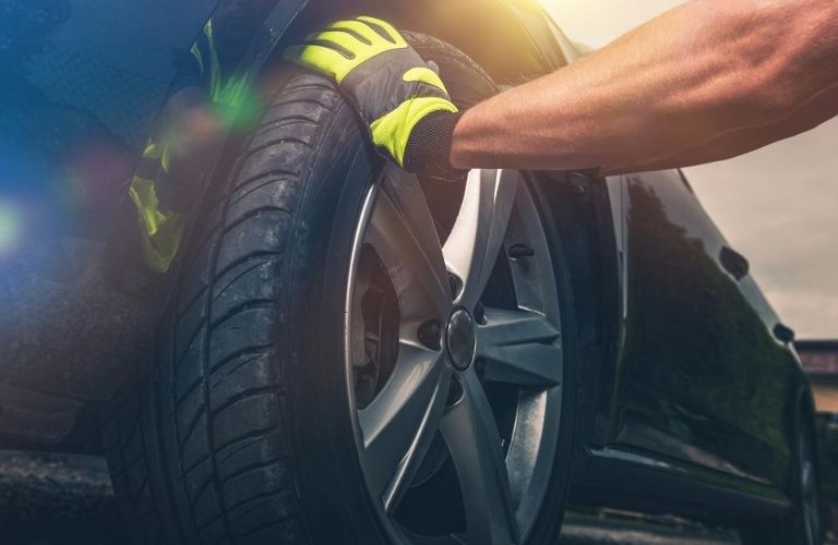 Mechanic Replacing a Tire