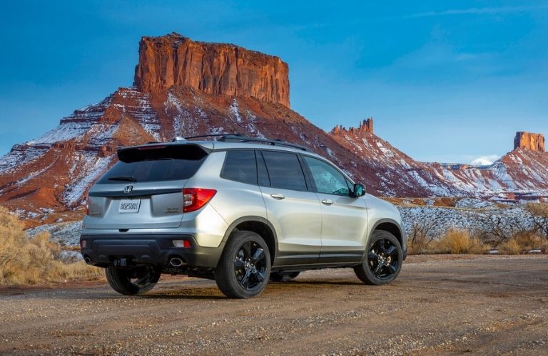 Silver 2021 Honda Passport Rear Exterior in Snowy Desert
