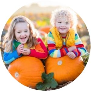 Two Girls with Pumpkins