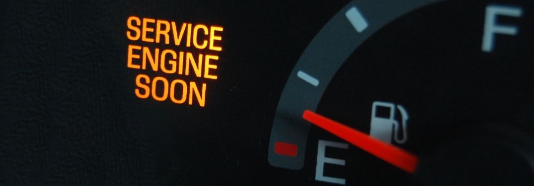 Close Up of a Service Engine Soon on a Dashboard