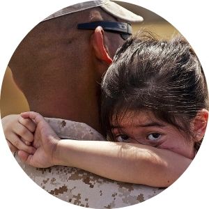 U.S. Marine Holding His Daughter