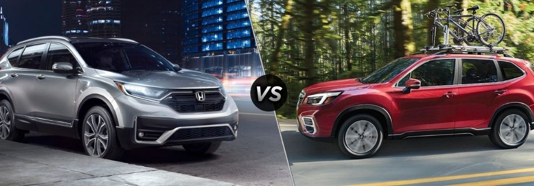 Silver 2021 Honda CR-V on a City Street vs Red 2021 Subaru Forester on a Country Road