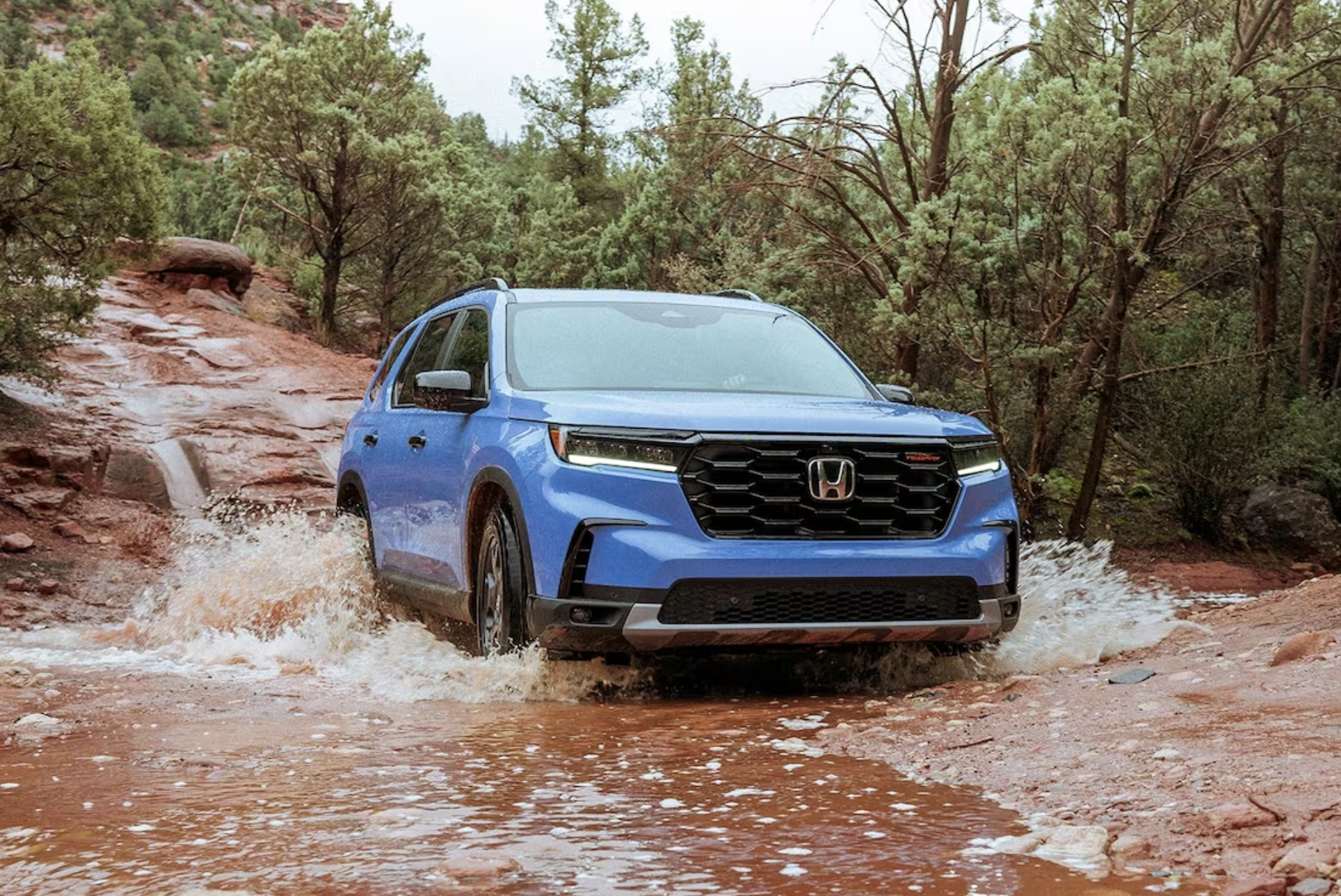 2025 Pilot has a stowable middle seat for extra cargo flexiblity.