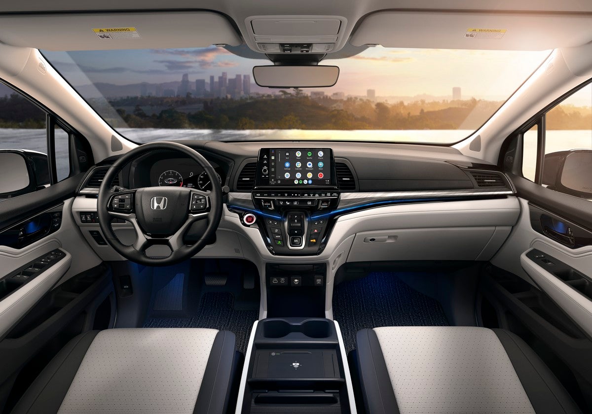 The modern cockpit of the new Odyssey in Avondale is seen from the back middle seat looking forward.